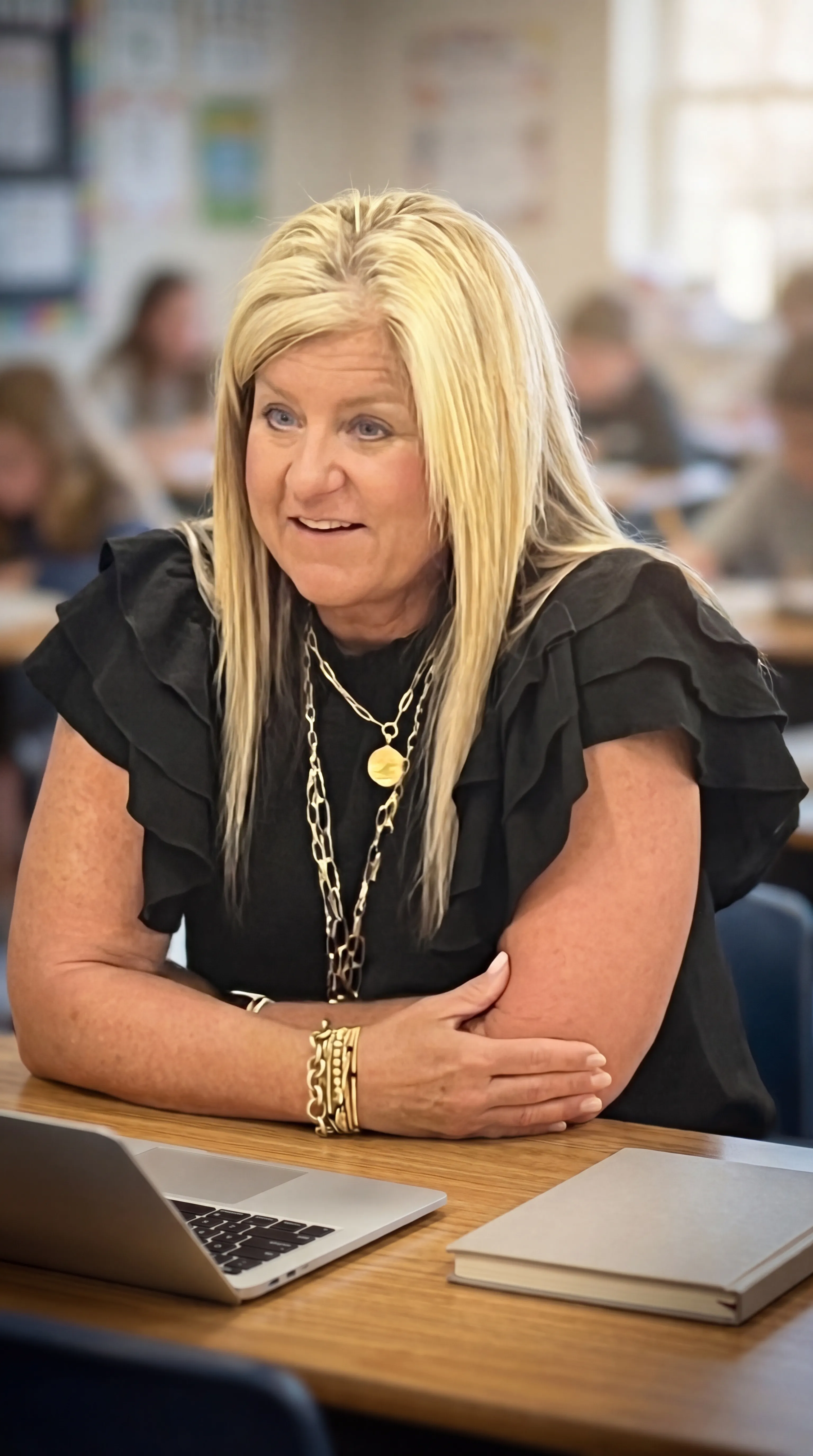 Melanie Wellons at desk